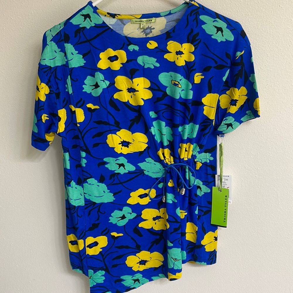 Women’s top by Trisha Tyler.